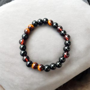 Armband med tigeröga och blodpärlor
