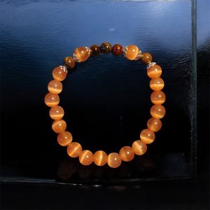 Orange cateye med Tigeröga